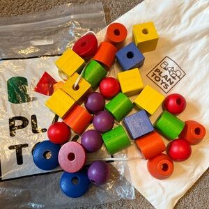 PLAN Toy Lacing Beads in cloth bag